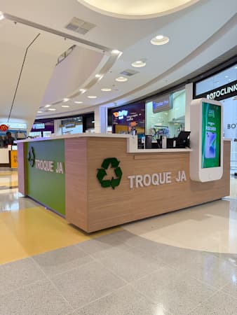 Imagem de interna da loja troque já