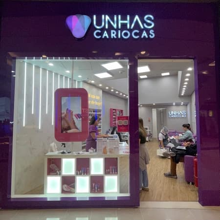 Logo da loja unhas cariocas  